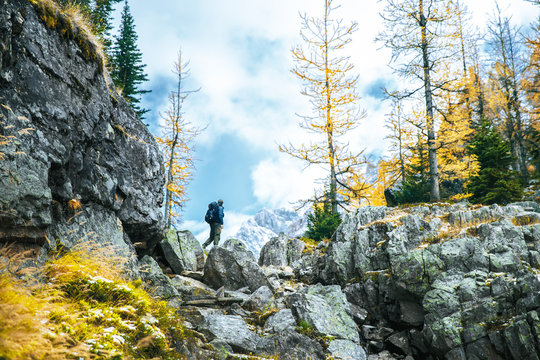 Backpacker hiking along Alpine circuit trail, Yoho National Park, Field, British Columbia, Canada