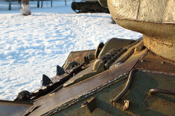 Old battle Tank on the snow, participated in the 2nd world war.