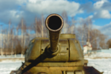 Old battle Tank on the snow, participated in the 2nd world war.