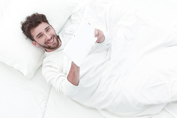 background image .attentive man digital tablet.