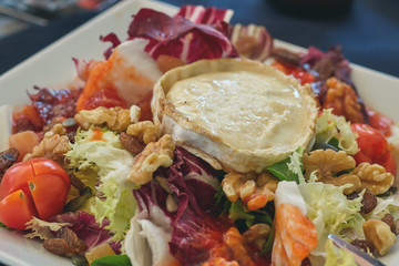 Fresh goat cheese salad on the Spanish restaurant