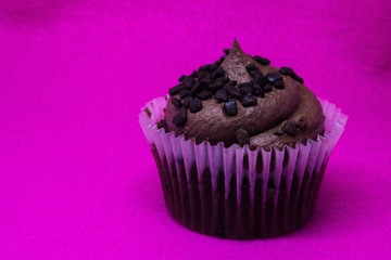 chocolate cupcake pink background