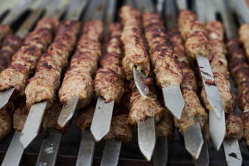Shish kebab on a metal stick, top view. Lula kebab on skewers