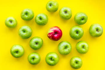 summer fruit pattern with apples on yellow background top view