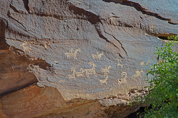Timeless rock art petroglyphs of ancients in Arches National Park.
