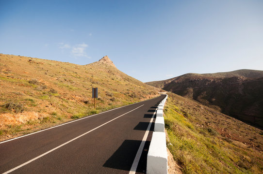 Road on mountainside, Calle de Regla, Fuerteventura, Canary Islands, Spain