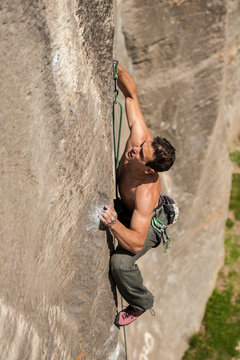 Lucas Iribarren climbs a 7a+ route in Balmanolesca, the most historical granite crag in Ossola, Italy.