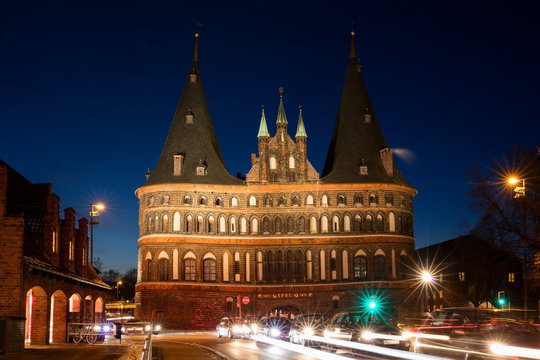 Germany, Schleswig-Holstein, Luebeck, Old town, Holsten Gate at blue hour