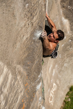 Lucas Iribarren climbs a 7a+ route in Balmanolesca, the most historical granite crag in Ossola, Italy.