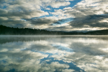 Stratocumulus clouds at sunrise over Stanley Lake in the Sawtooth Mountains of Idaho