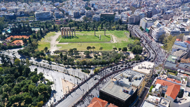 Aerial drone photo of military tanks stoped in Hadrian Arch during anual parade of Greek independence day on March 25, Athens, Attica, Greece