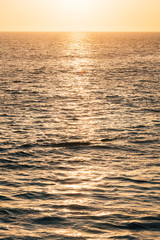 Waves in the Pacific Ocean at sunset, in Laguna Beach, Orange County, California