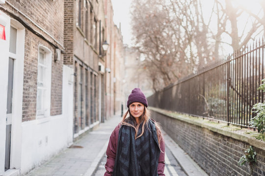 Portrait of woman on street, London, England, UK