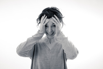 Portrait of scared and intimidated woman. Isolated on white. Human expressions and emotions