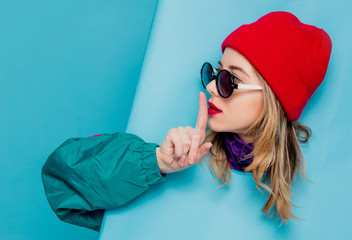 woman in red hat, sunglasses and suit of 90s