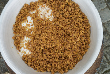 Traditional Azerbaijan food halwa cooking on bonfire, outdoors