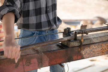 Asian female construction worker on building site