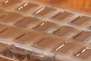 Part of the process of making homemade artisan chocolate sweets with different fillings for a special ocassion: valentine's day, a birthday or anniversary gift or the perfect souvenir
