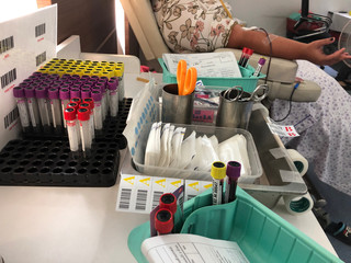 People is donating blood.