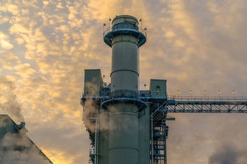 Power Plant with smoke emitted from smokestacks