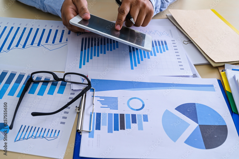 Poster business documents on office graph financial with social network diagram discussing data analysis da