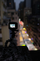 close up of gopro with tripod on the roof taking timelapse