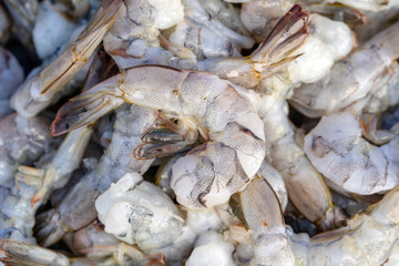 Peeled sea shrimp at street market in Thailand. Seafood concept.