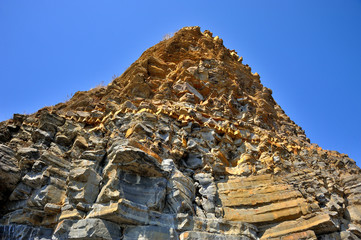 yellow cliff of sandstone, big high yellow cliff mountain of sandstone - 257559895