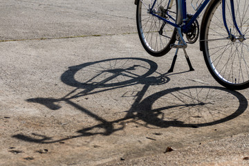 Fototapeta na wymiar Shadow of the bike on the road
