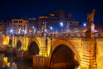 Fototapeta na wymiar Bridge Sant Angelo over Tiber river in the night