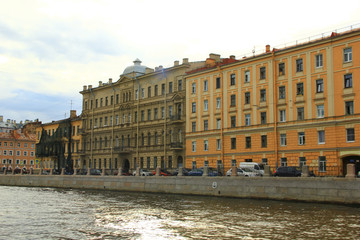Neva's stone embankment on a summer day