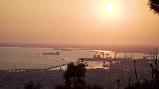 Thessaloniki / Greece 22 march 2019 : 4k sunset in the most beautiful city of Greece photo taken from the hilltop forest Kedrinos Lofos, also known as Seich Sou,the temperture is fine for a walk