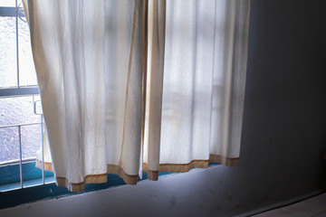 Beautiful morning light through sheer curtain in bedroom 