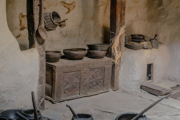 Kitchenware in the ancient Baltit fort. Karimabad, Hunza valley. Gilgit Baltistan, Pakistan.