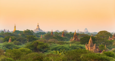 Fototapeta na wymiar Stunning view of the beautiful Bagan ancient city (formerly Pagan) during sunset. The Bagan Archaeological Zone is a main attraction in Myanmar and over 2,200 temples and pagodas still survive today.