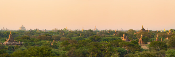 Fototapeta na wymiar Stunning panoramic view of the Bagan ancient city (formerly Pagan) during sunset. The Bagan Archaeological Zone is a main attraction in Myanmar and over 2,200 temples and pagodas still survive today.