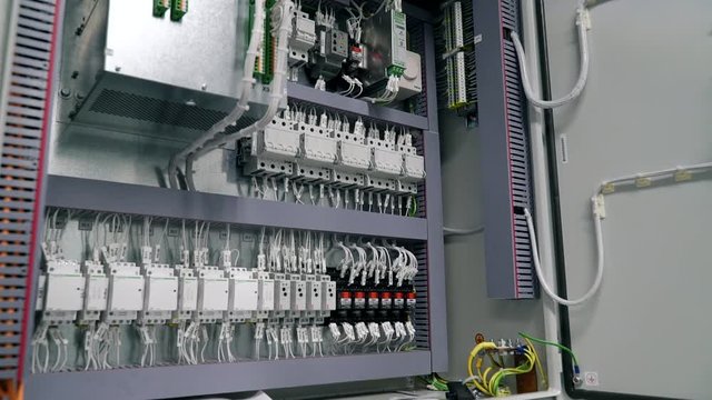 electrical box contains many terminals, relays, wires and switches. Manufacture and installation concept concept.