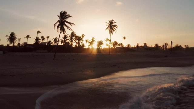 Aerial: The famous town for kitesurfing, Cumbuco, Brazil. Shot during sunset.