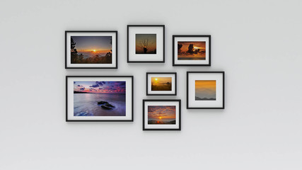 picture in photo frame on wall.Concept Sunset (3d rendering)