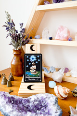 The Star card from the Tarot Major Arcana on witch's altar