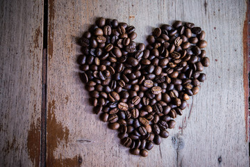coffee beans arranged in the shape of a heart