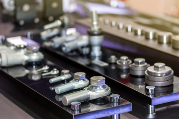 close up many kind and size of screw rod end or spherical joint on table