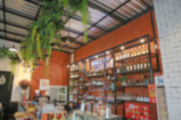 Blurred image of classic counter and alcohol drink bottle at club pub or bar.