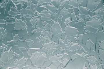 Snow patterns on glass as an abstract background