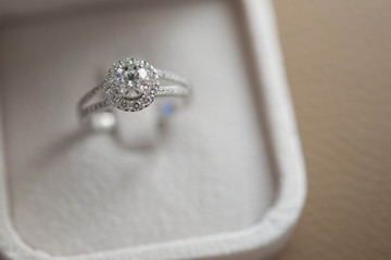 wedding ring diamond on wood background