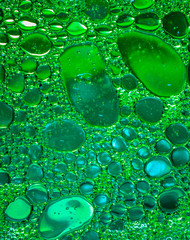 Abstract background of different colors with round drops.