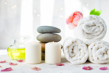 Spa, beauty treatment and wellness background Towel Cosmetic Massage oil, flowers and candel