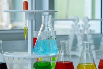 Chemical tube set development and pharmacy in laboratory  with multicolored substances in laboratory - Image