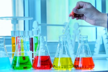 Chemical tube set development and pharmacy in laboratory  with multicolored substances in laboratory - Image