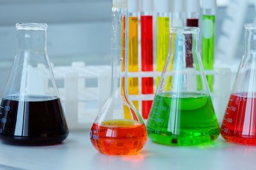 Chemical tube set development and pharmacy in laboratory  with multicolored substances in laboratory - Image